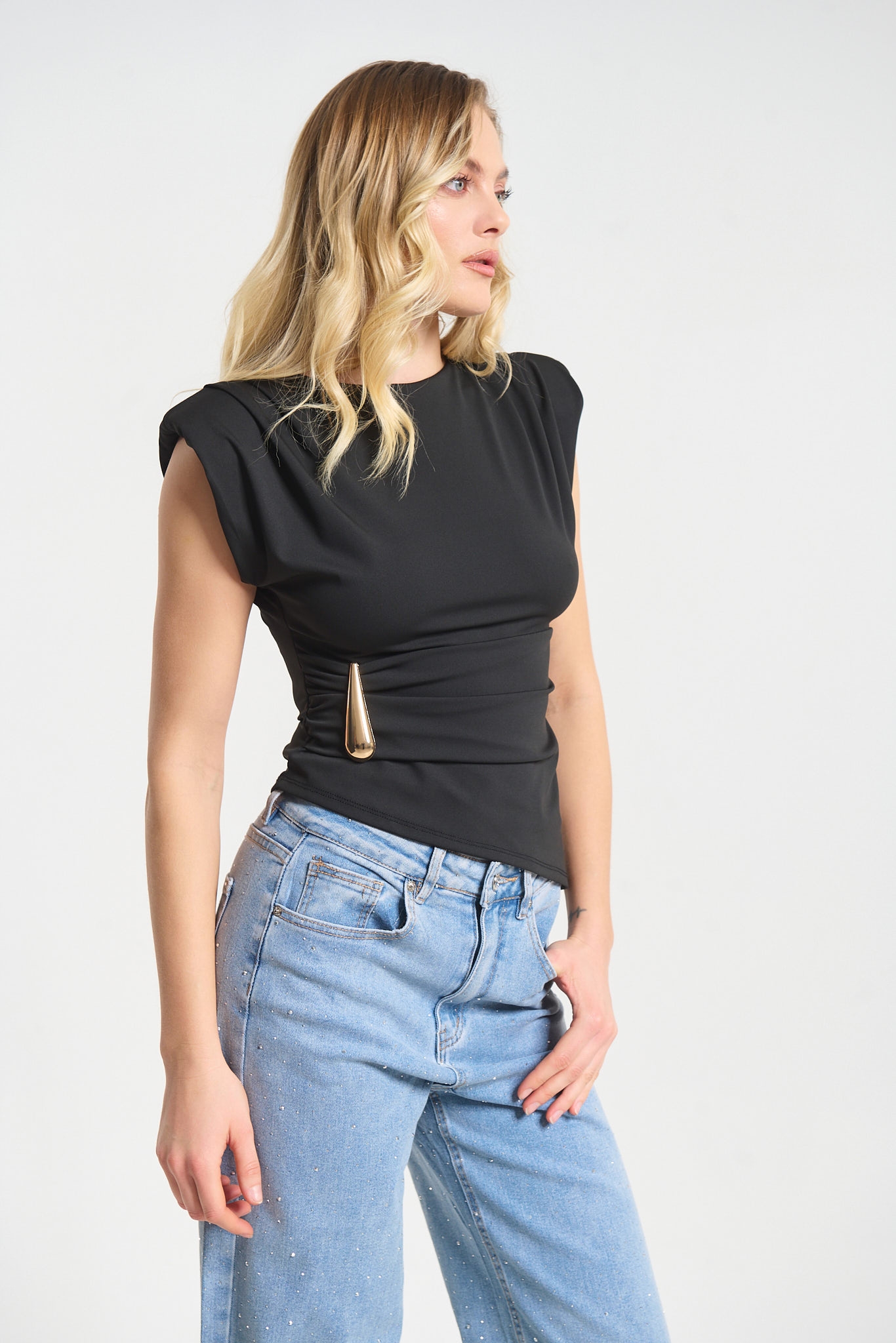 Sleeveless Top Featuring Shoulder Pads and Gold Teardrop Detail