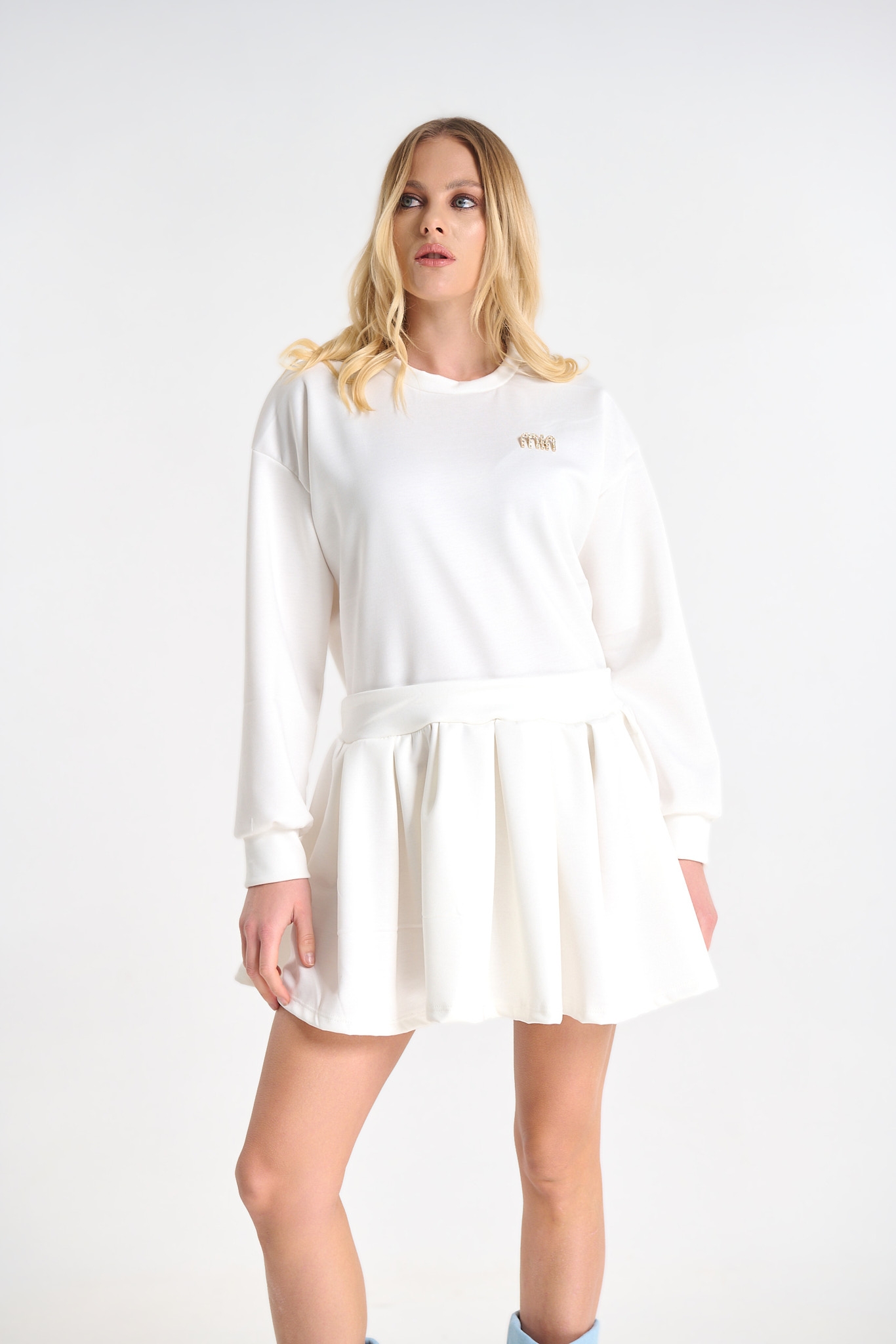 Dress with Pleated Detail and Decorative Brooch