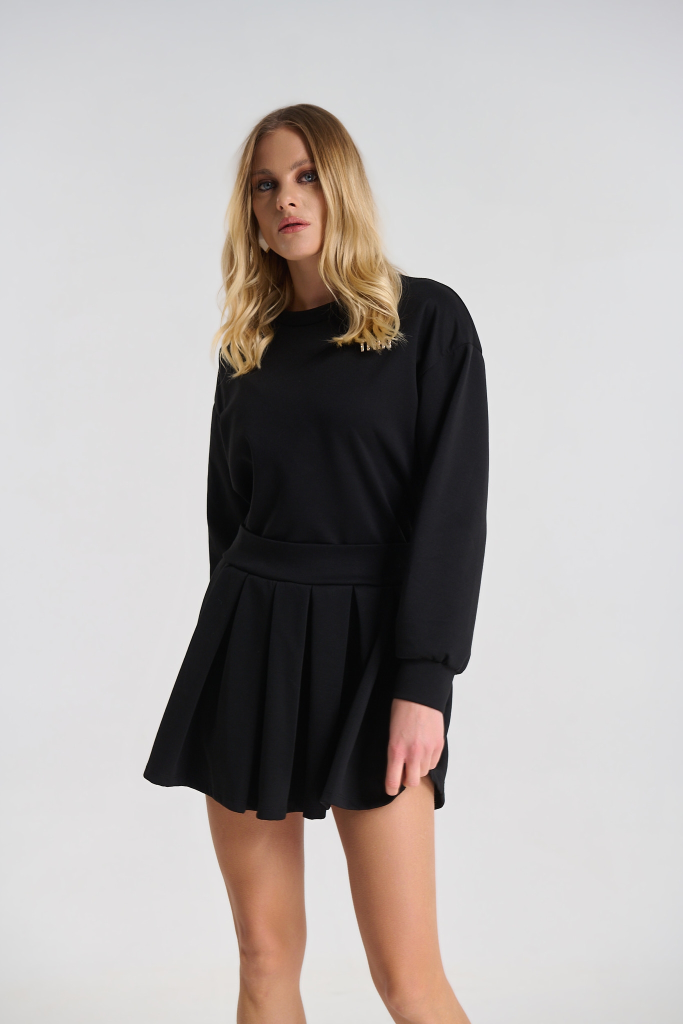 Dress with Pleated Detail and Decorative Brooch