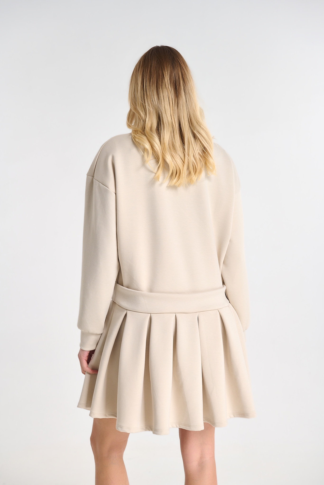 Dress with Pleated Detail and Decorative Brooch