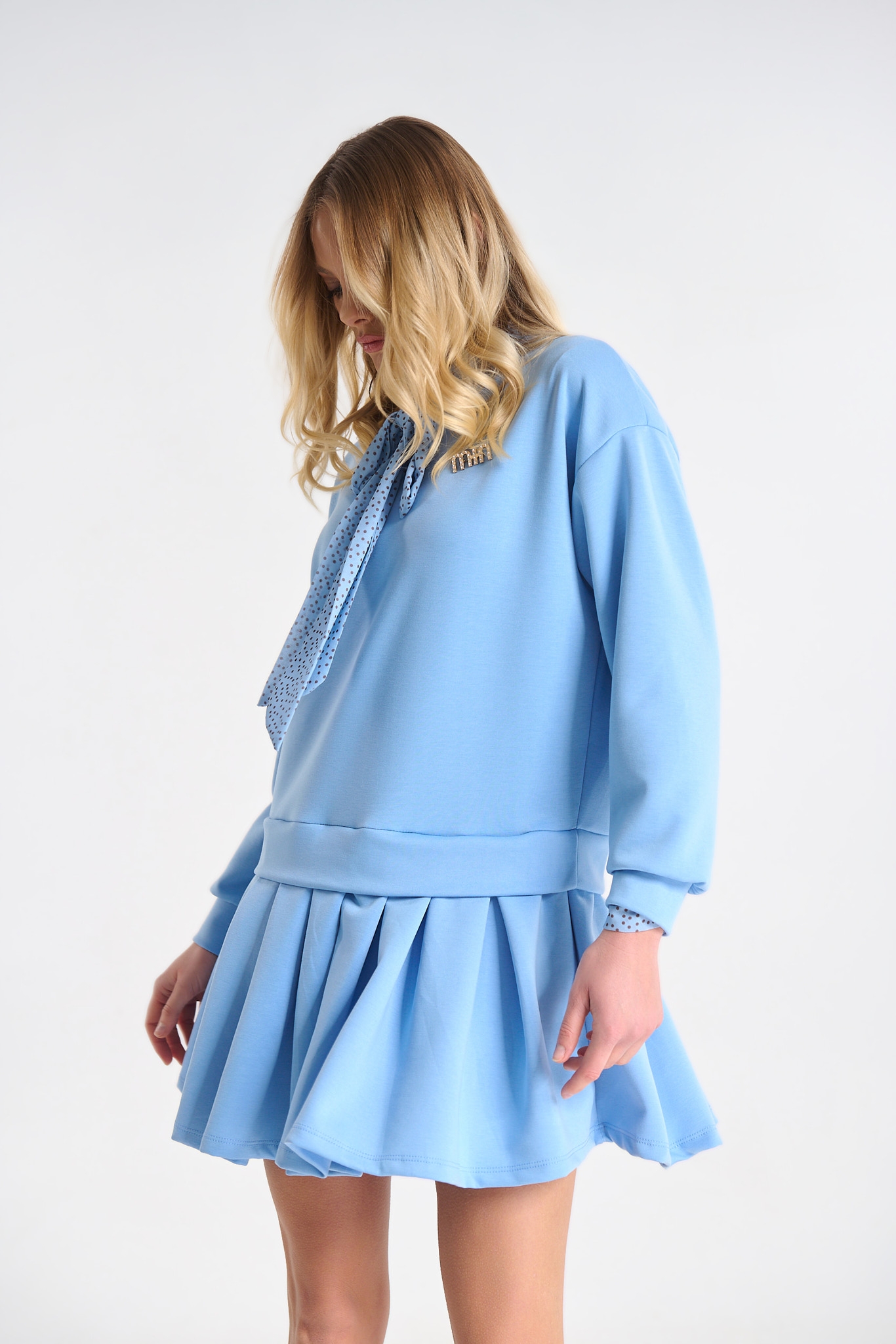 Dress with Pleated Detail and Decorative Brooch