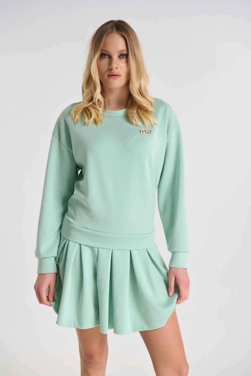 Dress with Pleated Detail and Decorative Brooch