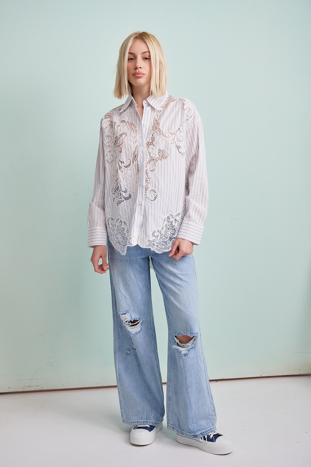 Ripped Bell-Bottomed Jeans