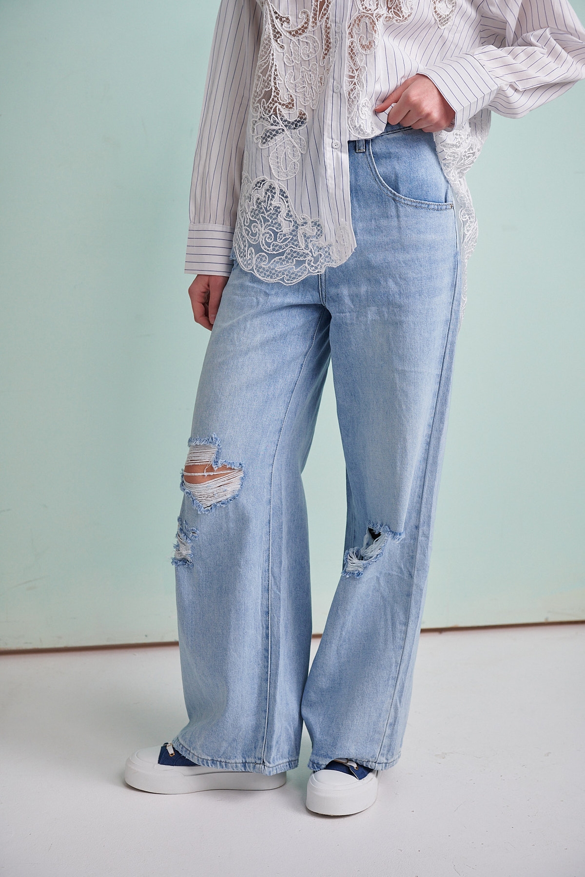 Ripped Bell-Bottomed Jeans