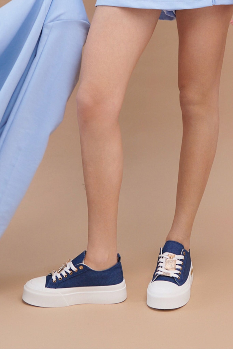 Sneakers In Jeans