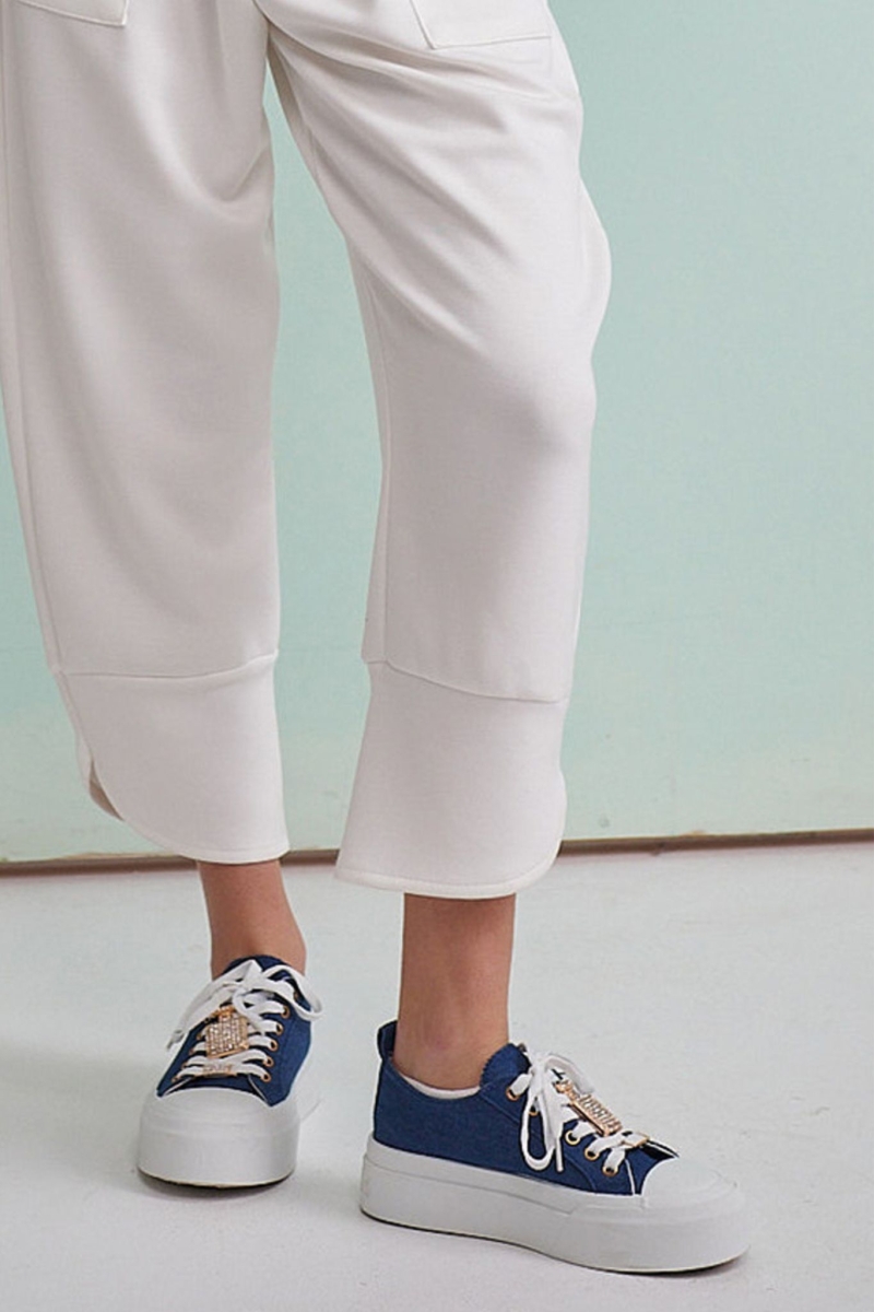 Sneakers In Jeans